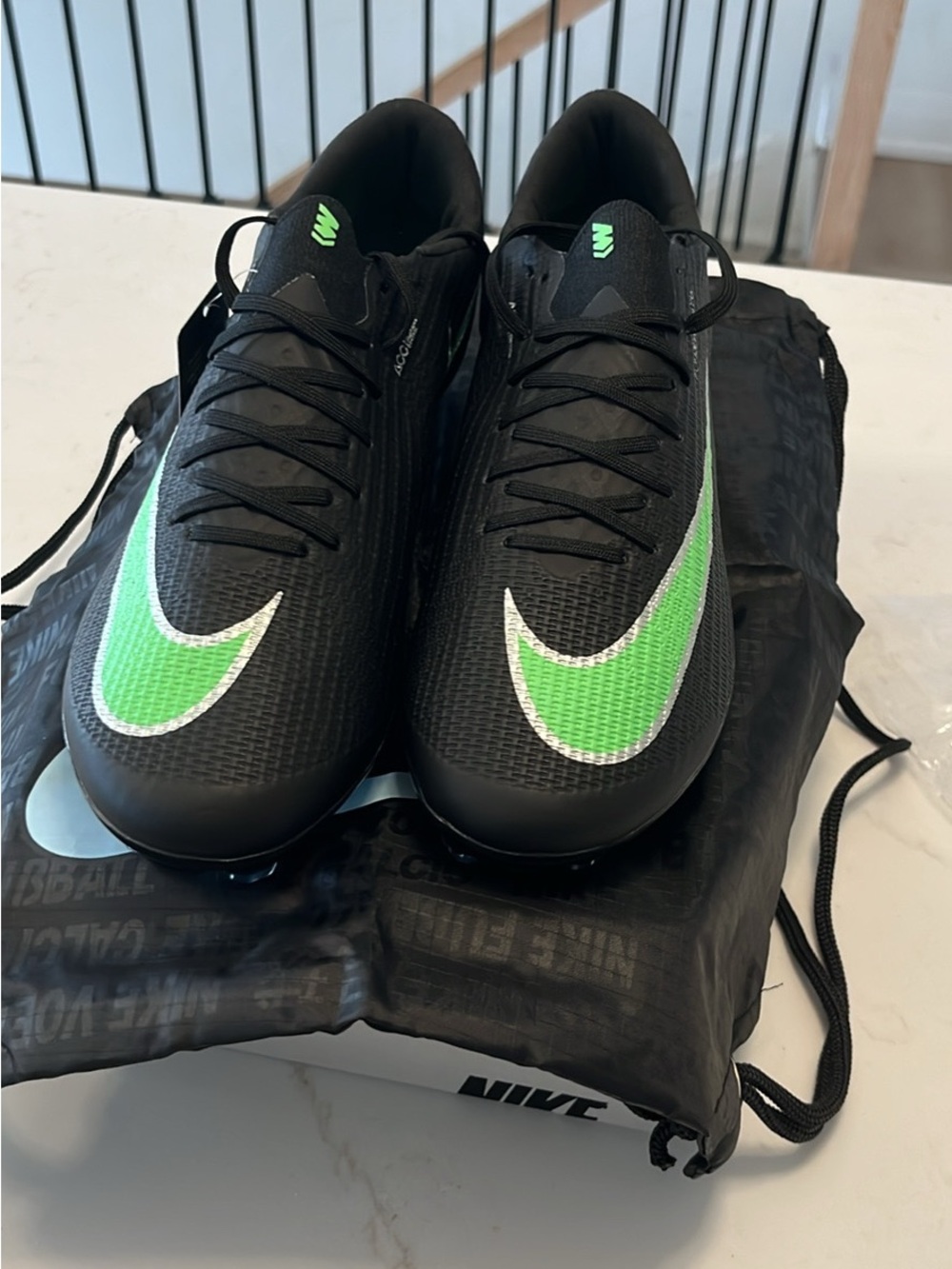 Nike Men’s Black Athletic Cleats with Bright Green Swoosh